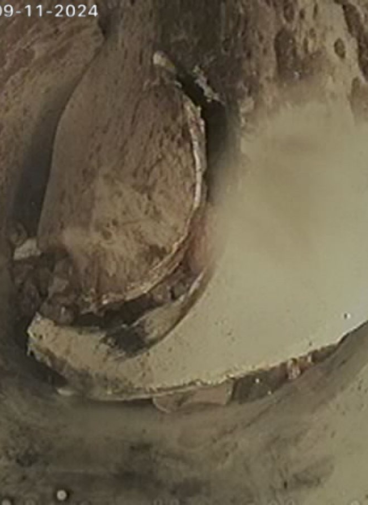 Damaged sewer pipe after cleaning